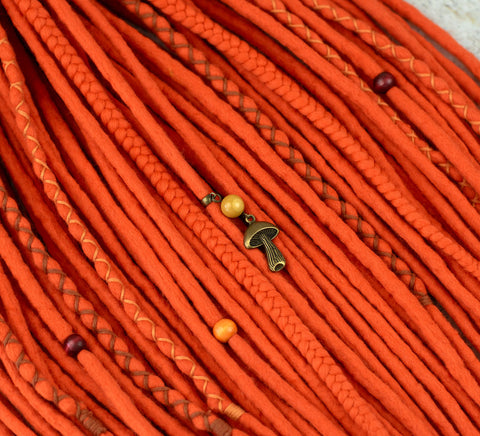 Orange wool dreads and braids
